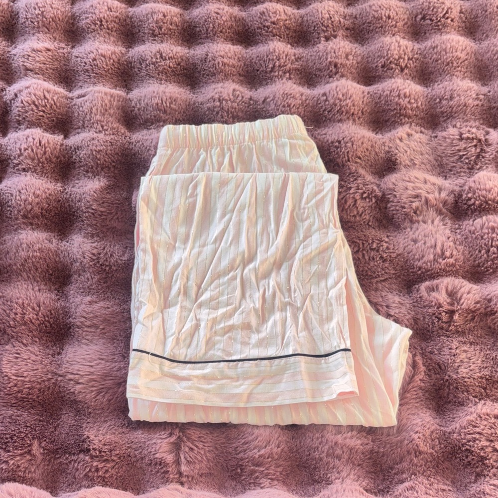 Victoria's Secret Light Pink Pajama set
(Pants and top)